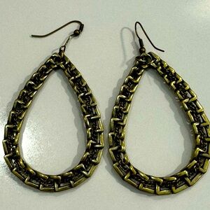 Bronze tone long hoop earrings.